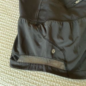 black lulu lemon shorts with mesh lining